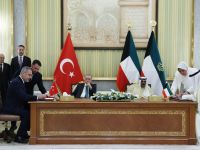 This handout photograph taken and released by Turkish Presidency Press Office on October 21, 2025, shows Turkey's President Recep Tayyip Erdogan (C-L), Kuwait's Emir Sheikh Meshal al-Ahmad al-Sabah (C-R), Turkey's Foreign Minister Hakan Fidan (L) and Kuwait's First Deputy Prime Minister and Interior Minister Sheikh Fahad Yousef Saud al-Sabah (R) attend a signing cerenomy for the agreements between the two countries in Kuwait City. AFP Erdoğan begins Gulf tour to strengthen trade and security cooperation