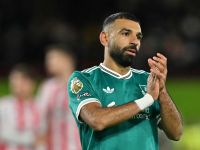 روني يشكك في قيادة محمد صلاح داخل غرفة ملابس ليفربول (Photo by Glyn KIRK / AFP) روني يشكك في قيادة محمد صلاح داخل غرفة ملابس ليفربول