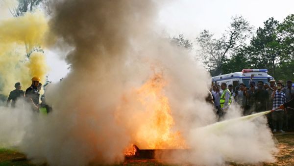 Fire department personnel take part in the nationwide civil defence mock drill in Guwahati on May 7, 2025, as border tensions surge. (Photo by Biju BORO / AFP) Pakistan