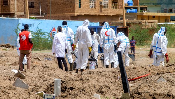 Members of the Sudanese Red Crescent and forensic experts exhume the remains of people from makeshift graves for reburial in the local cemetery in Khartoum's southern suburb of al-Azhari on August 2, 2025 after the dead were buried in a rush when the area was under control of the Rapid Support Forces (RSF) paramilitaries. AFP Renewed clashes erupt in Sudan’s El Fasher as RSF drone attacks hit Khartoum